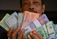 Attachment for Mengapa Rupiah Jatuh ke Rekor Terendah?